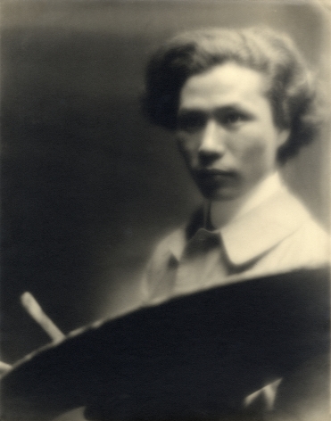 Black and white portrait of an Japanese American painter/artist circa 1920.